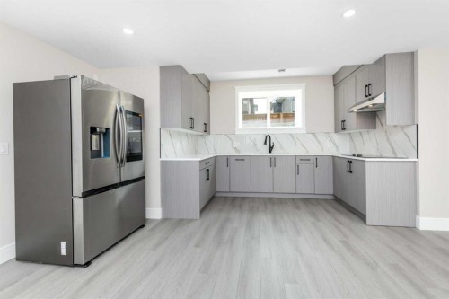 1004 Waterford Drive, Chestermere, AB - Indoor Photo Showing Kitchen