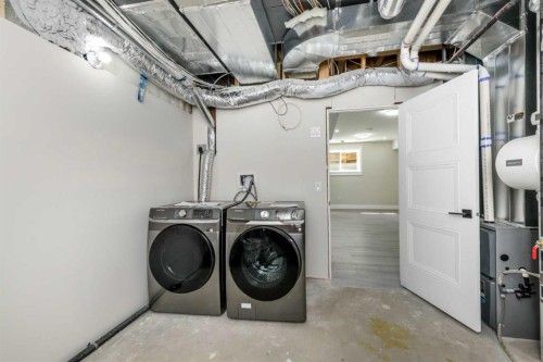 1004 Waterford Drive, Chestermere, AB - Indoor Photo Showing Laundry Room