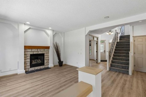 420 Royal Oak Circle Nw, Calgary, AB - Indoor Photo Showing Living Room With Fireplace