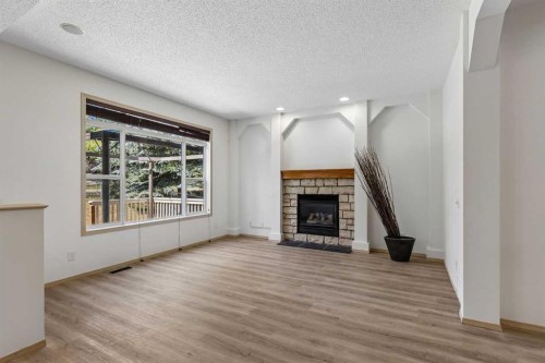 420 Royal Oak Circle Nw, Calgary, AB - Indoor Photo Showing Living Room With Fireplace
