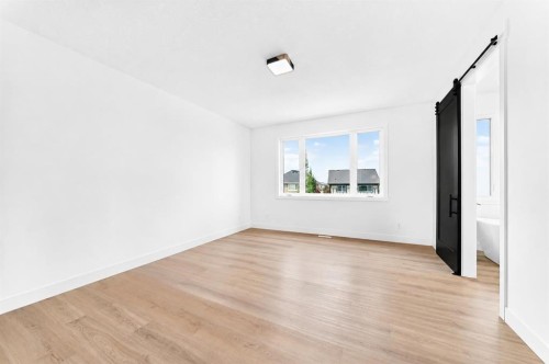 79 Sundown Way, Cochrane, AB - Indoor Photo Showing Other Room