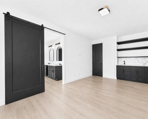 79 Sundown Way, Cochrane, AB - Indoor Photo Showing Other Room