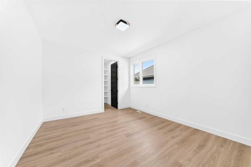 79 Sundown Way, Cochrane, AB - Indoor Photo Showing Other Room