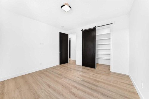 79 Sundown Way, Cochrane, AB - Indoor Photo Showing Other Room