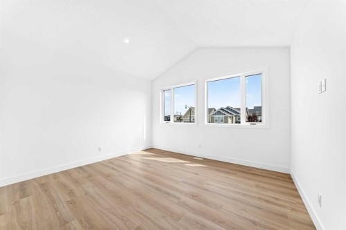 79 Sundown Way, Cochrane, AB - Indoor Photo Showing Other Room