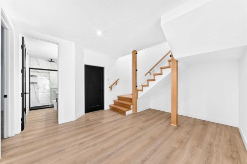 79 Sundown Way, Cochrane, AB - Indoor Photo Showing Other Room
