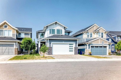 79 Sundown Way, Cochrane, AB - Outdoor With Facade