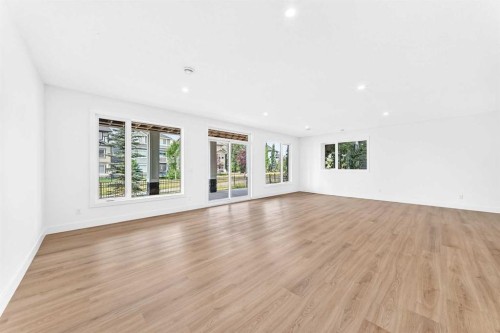 79 Sundown Way, Cochrane, AB - Indoor Photo Showing Living Room