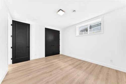 79 Sundown Way, Cochrane, AB - Indoor Photo Showing Other Room