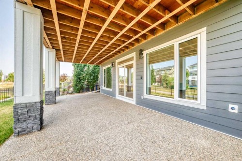 79 Sundown Way, Cochrane, AB - Outdoor With Deck Patio Veranda With Exterior