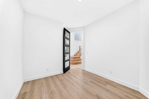 79 Sundown Way, Cochrane, AB - Indoor Photo Showing Other Room