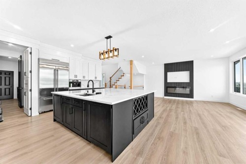 79 Sundown Way, Cochrane, AB - Indoor Photo Showing Kitchen With Upgraded Kitchen