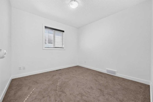377 Panora Way Nw, Calgary, AB - Indoor Photo Showing Other Room
