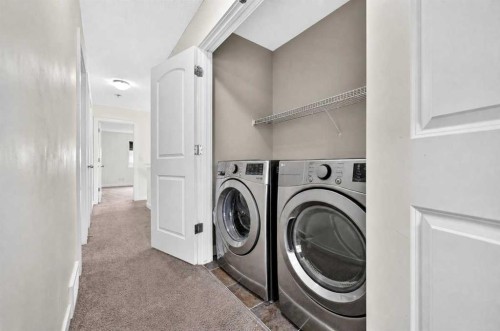 377 Panora Way Nw, Calgary, AB - Indoor Photo Showing Laundry Room