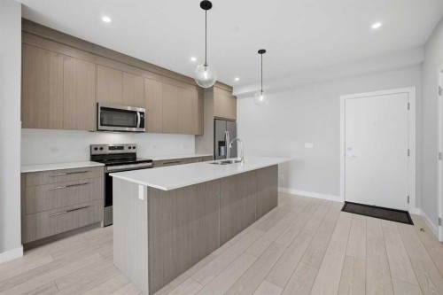 2303-60 Skyview Ranch Road Ne, Calgary, AB - Indoor Photo Showing Kitchen With Stainless Steel Kitchen