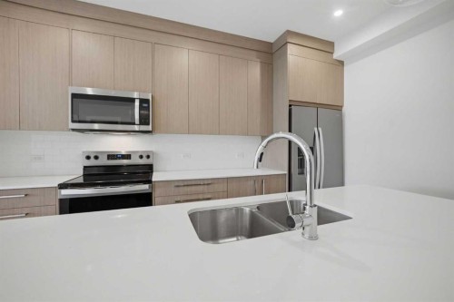 2303-60 Skyview Ranch Road Ne, Calgary, AB - Indoor Photo Showing Kitchen With Stainless Steel Kitchen With Double Sink With Upgraded Kitchen