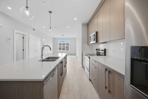 2303-60 Skyview Ranch Road Ne, Calgary, AB - Indoor Photo Showing Kitchen With Double Sink With Upgraded Kitchen