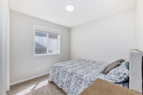 276 Belmont Boulevard Sw, Calgary, AB - Indoor Photo Showing Bedroom