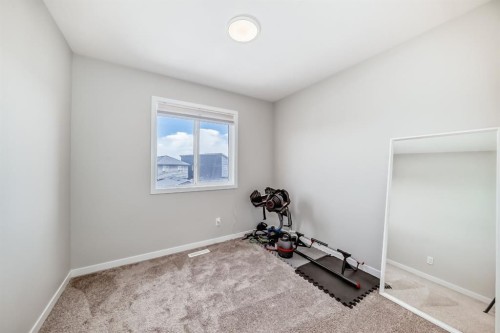 276 Belmont Boulevard Sw, Calgary, AB - Indoor Photo Showing Gym Room