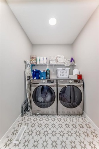 276 Belmont Boulevard Sw, Calgary, AB - Indoor Photo Showing Laundry Room