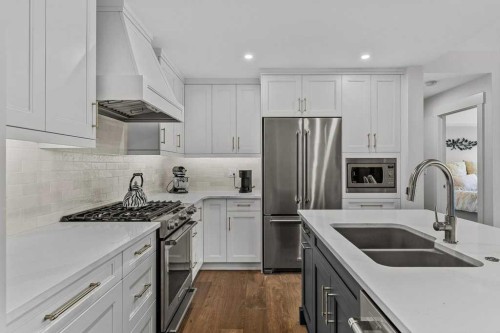 311-1315 Spring Creek Gate, Canmore, AB - Indoor Photo Showing Kitchen With Double Sink With Upgraded Kitchen