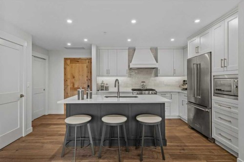 311-1315 Spring Creek Gate, Canmore, AB - Indoor Photo Showing Kitchen With Upgraded Kitchen