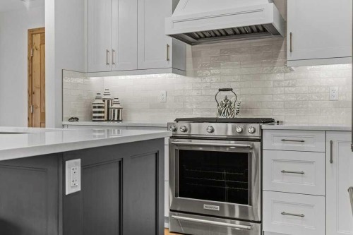 311-1315 Spring Creek Gate, Canmore, AB - Indoor Photo Showing Kitchen With Upgraded Kitchen