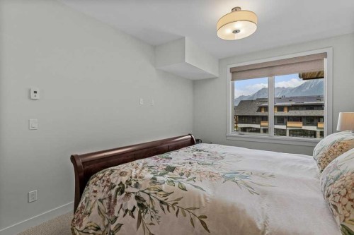 311-1315 Spring Creek Gate, Canmore, AB - Indoor Photo Showing Bedroom