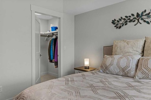 311-1315 Spring Creek Gate, Canmore, AB - Indoor Photo Showing Bedroom