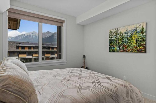 311-1315 Spring Creek Gate, Canmore, AB - Indoor Photo Showing Bedroom