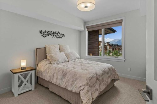 311-1315 Spring Creek Gate, Canmore, AB - Indoor Photo Showing Bedroom