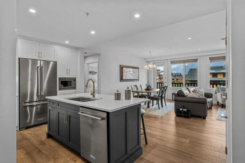 311-1315 Spring Creek Gate, Canmore, AB - Indoor Photo Showing Kitchen With Double Sink With Upgraded Kitchen