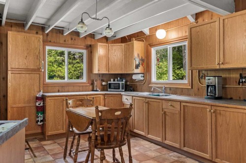 9 Des Arcs Road, Lac Des Arcs, AB - Indoor Photo Showing Kitchen With Double Sink