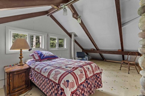 9 Des Arcs Road, Lac Des Arcs, AB - Indoor Photo Showing Bedroom
