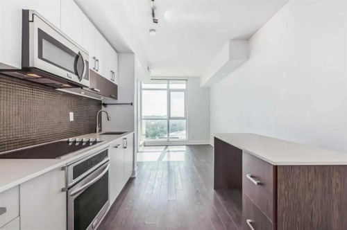 1605-550 Riverfront Avenue Se, Calgary, AB - Indoor Photo Showing Kitchen With Upgraded Kitchen
