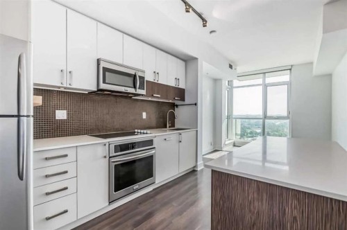 1605-550 Riverfront Avenue Se, Calgary, AB - Indoor Photo Showing Kitchen With Upgraded Kitchen
