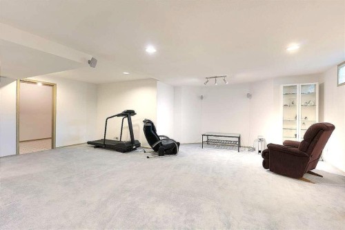 140 Santana Mews Nw, Calgary, AB - Indoor Photo Showing Gym Room