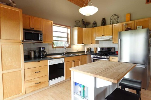 34072 Range Road 53, Rural Mountain View County, AB - Indoor Photo Showing Kitchen With Double Sink