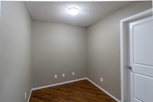 1108-5 Saddlestone Way Ne, Calgary, AB - Indoor Photo Showing Other Room