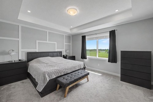 1340 Lackner Boulevard, Carstairs, AB - Indoor Photo Showing Bedroom