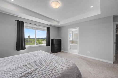 1340 Lackner Boulevard, Carstairs, AB - Indoor Photo Showing Bedroom
