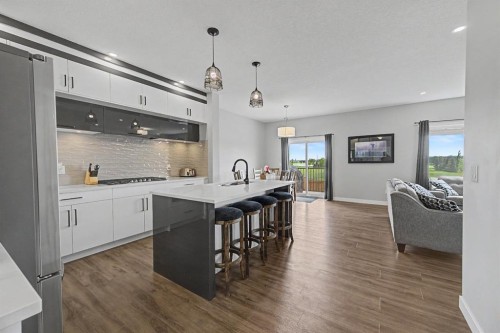 1340 Lackner Boulevard, Carstairs, AB - Indoor Photo Showing Kitchen With Upgraded Kitchen