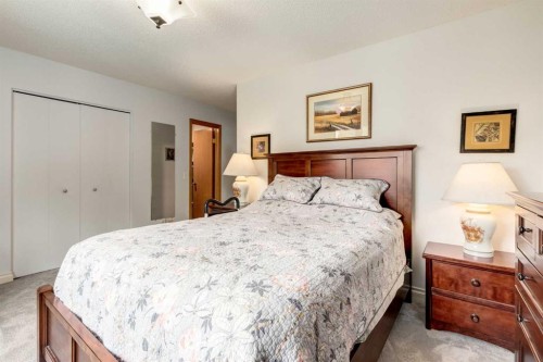15 Sunrise Crescent Se, Calgary, AB - Indoor Photo Showing Bedroom
