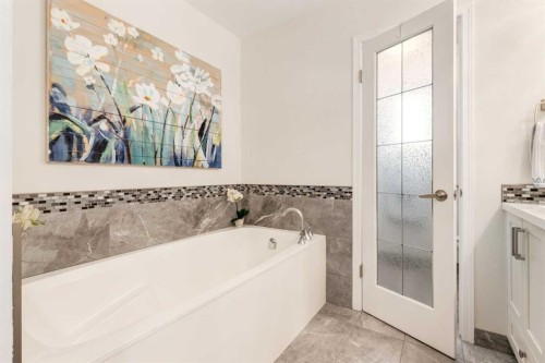 15 Sunrise Crescent Se, Calgary, AB - Indoor Photo Showing Bathroom