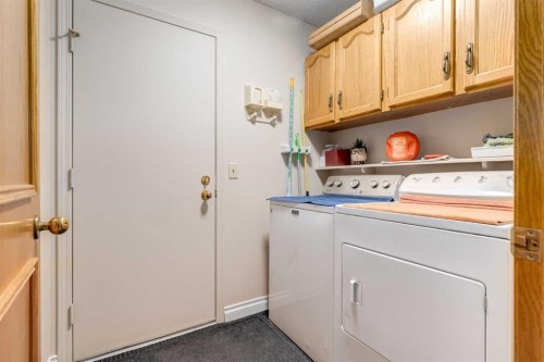 15 Sunrise Crescent Se, Calgary, AB - Indoor Photo Showing Laundry Room