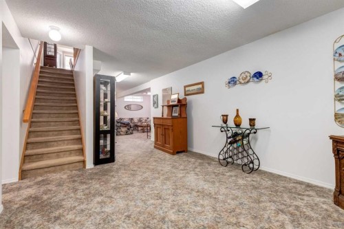 15 Sunrise Crescent Se, Calgary, AB - Indoor Photo Showing Other Room
