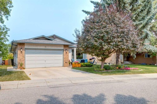 15 Sunrise Crescent Se, Calgary, AB - Outdoor With Facade