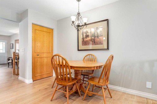 15 Sunrise Crescent Se, Calgary, AB - Indoor Photo Showing Dining Room