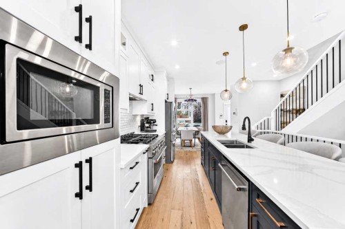 1703 31 Avenue Sw, Calgary, AB - Indoor Photo Showing Kitchen With Double Sink With Upgraded Kitchen