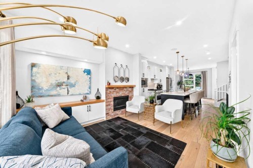 1703 31 Avenue Sw, Calgary, AB - Indoor Photo Showing Living Room With Fireplace